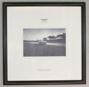 Framed presentation image of Aston Martin V12 Vanquish from the Millbrook Performance Driving Course